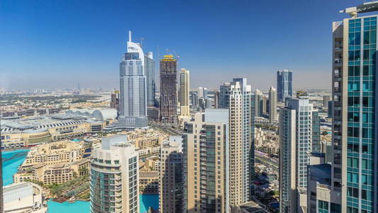 迪拜市中心一整天, 直到日落 timelapse, 豪华的现代建筑和阴影移动非常迅速, 未来的城市景观阿拉伯联合酋长国。摩天大楼