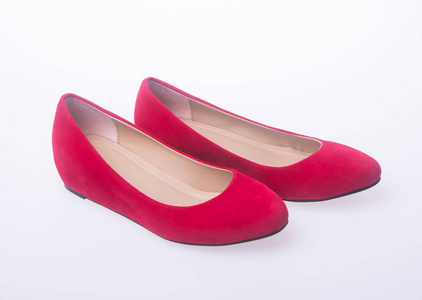 鞋。在背景上的红色和时尚女人鞋
