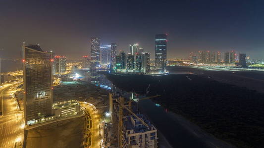 在阿布扎比的 al Reem 和 al Maryah 岛上的摩天大楼, 整个晚上 timelapse 从上面。空中 citisc
