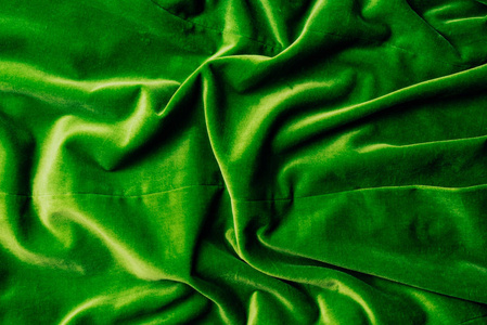 绿色光泽天鹅绒织物的顶部视图背景