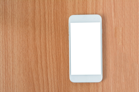 白色木背景上的空白屏幕手机