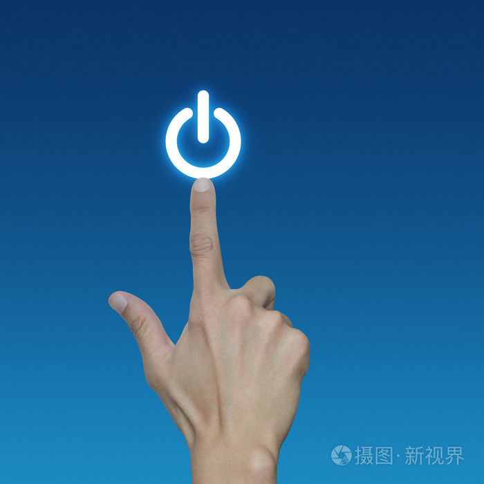 手在蓝色的背景下,按电源按钮启动概念