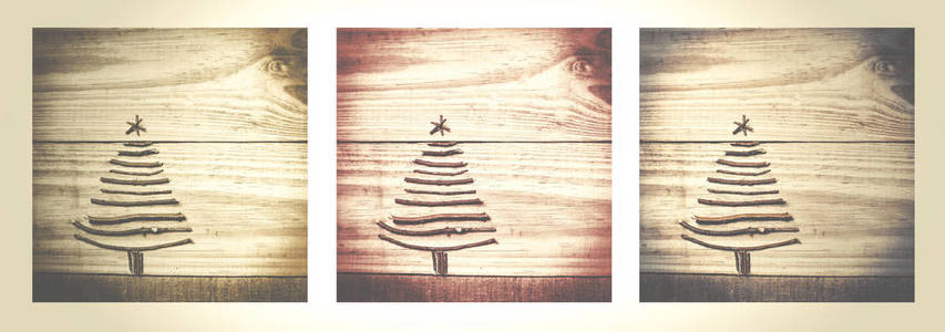 圣诞树由木 蓝色背景上的干树枝。图像的雪花。圣诞树装饰品 工艺品 礼品