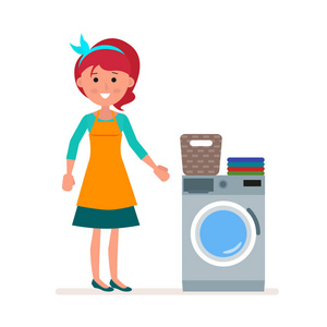 成人的责任女人的家庭主妇在洗衣机里洗衣服.经典的家庭责任的入住.