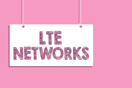 概念性手写显示 Lte 网络。商务照片文本最快网络连接可用于无线通信挂板通信信息打开关闭标志粉红色背景