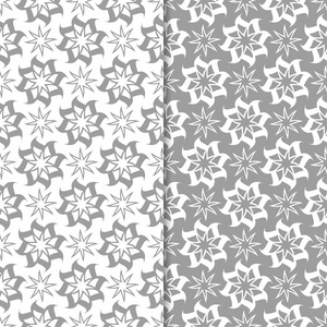 白色和灰色的花卉背景集。纺织品和墙纸无缝图案