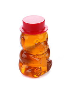 形状像熊的瓶子，里面装满了蜂蜜。