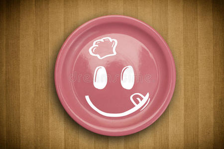 彩色盘子上的快乐笑脸卡通脸