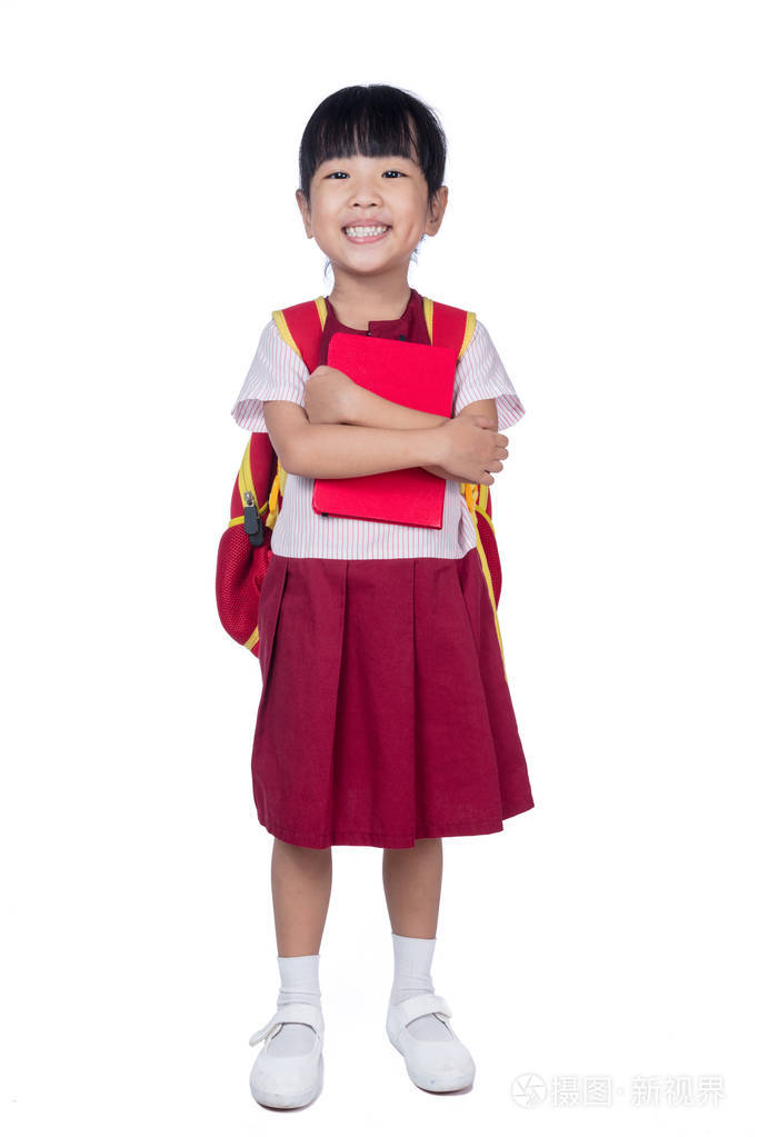 亚洲中国小女孩在学校制服，书包