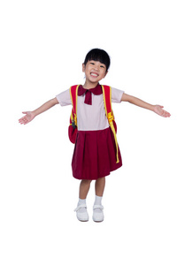 亚洲中国小女孩在学校制服，书包