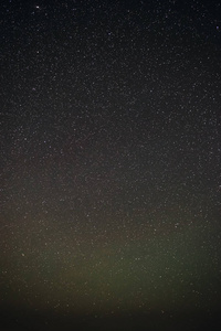 灰色和蓝色星空夜空的垂直背景图片