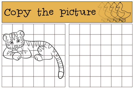 儿童游戏复制图片。 小可爱的老虎宝宝笑了。