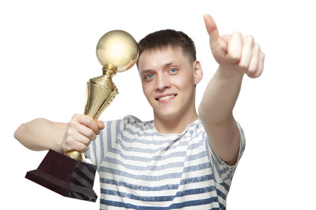 人在竞争中的赢家举起金奖杯图片