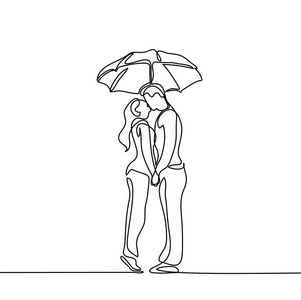 浪漫的年轻情侣接吻在伞下图片