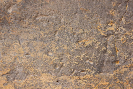 纹理旧墙。布拉格古庙的表面。设计师的石头背景。棕色色调的老式图案