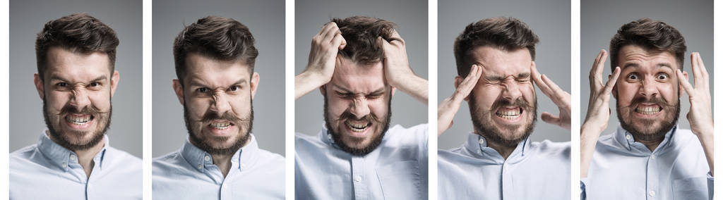 一套年轻的男人肖像, 不同的悲伤和愤怒的情绪照片