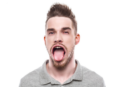 室内风吹风吹起嘴的年轻人照片