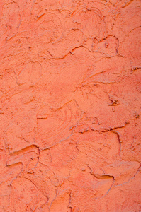 背景的橙色的灰泥涂层和漆外观