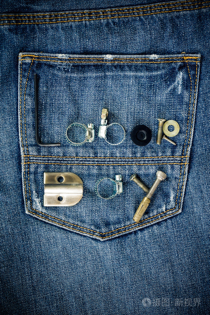 劳动节文本上牛仔裤背景概念
