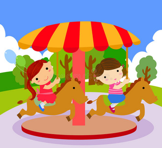 孩子们坐在旋转木马上照片