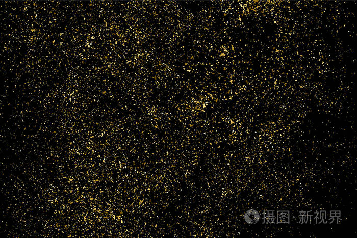 金色亮片纹理上黑色孤立.琥珀色粒子颜色.喜庆的背景.