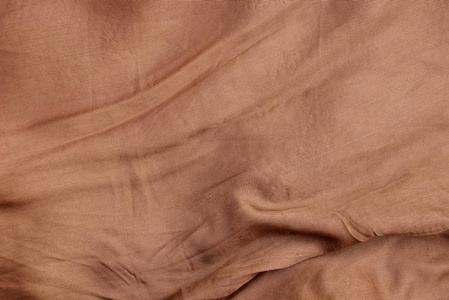 布的褐色质地从一块皱巴巴的布料