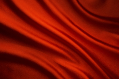 真丝织物波背景，抽象红色缎布纹理