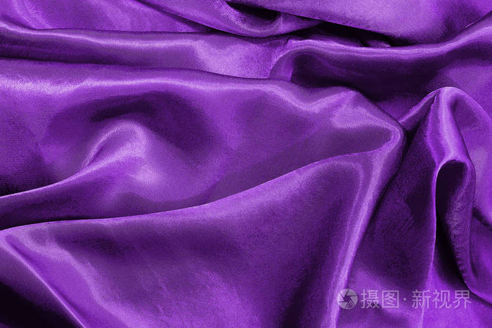 光滑的紫色缎纹织物褶皱.丝绸.缎纹背景.色调
