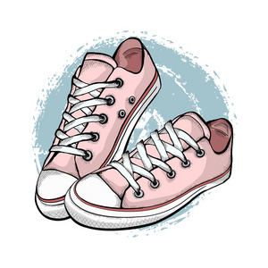 一双粉红色的运动鞋被隔离在白色背景上