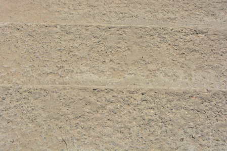 砂砾和沙子的黄色混凝土背景, 具体步骤