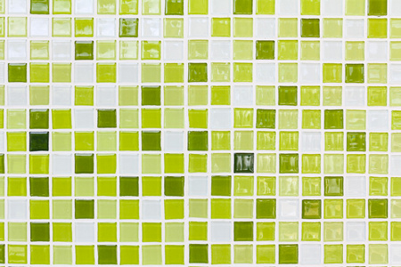 在色调的绿色的墙体和地板马赛克瓷砖