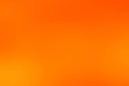 抽象柔和多彩的光滑模糊的纹理背景在金色, 黄色和橙色的色调色调照片