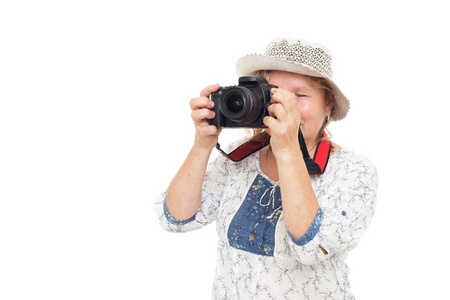 女人学会举行 photocamera 和了解设置