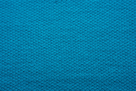 宏的织物编织纹理表面蓝色或靛青蓝色为背景的使用