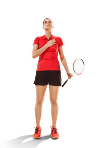 年轻女子羽毛球运动员站在白色背景