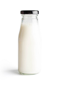 牛奶瓶和牛奶玻璃在白色背景下图片