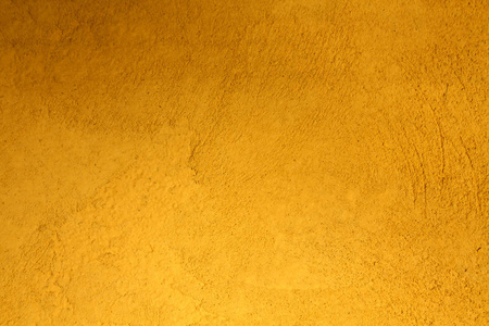 黄色蹩脚水泥墙。抽象背景与设计模式