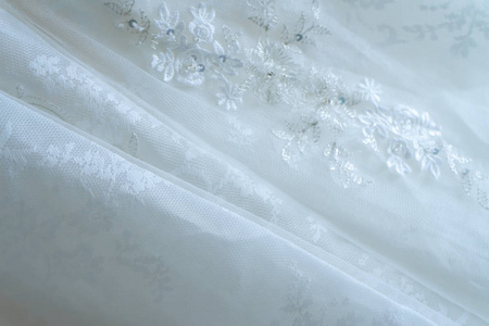 亲密的白色婚纱礼服背景的软焦点