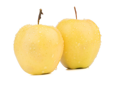 两个全黄色的苹果在白色背景下被隔离。健康有机水果和维他命