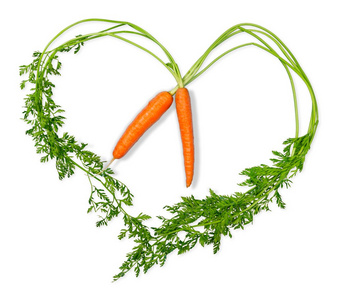 两个胡萝卜两个胡萝卜在心的形状照片
