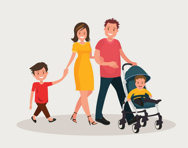 有孩子的父母.爸爸妈妈和长子和长子一起散步.照片