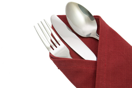 叉勺和孤立的红色餐巾刀