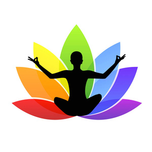 年轻的人坐在瑜伽冥想莲花位置剪影与五颜六色的百合在彩虹颜色