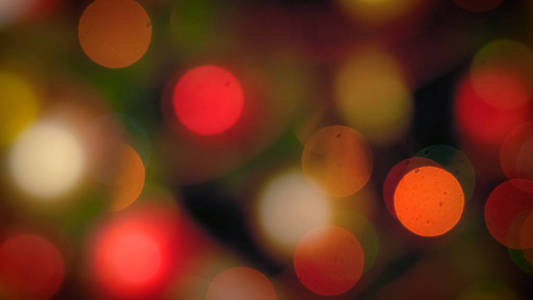 从圣诞树上五颜六色的灯光 bokehs 的抽象形象