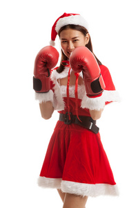 亚洲圣诞圣诞老人女孩与拳击手套