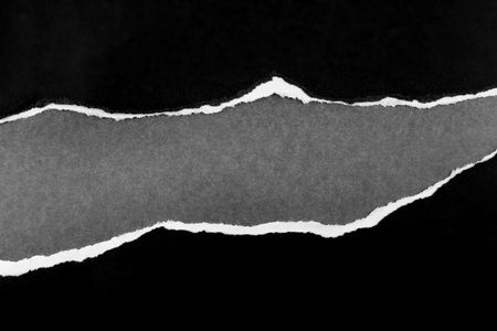 黑色的差距撕纸的差距照片