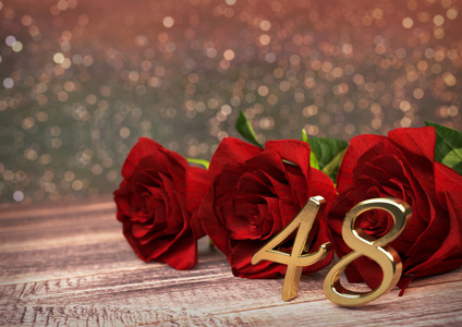 生日概念与红色玫瑰木桌上。四十八。48.3d 渲染