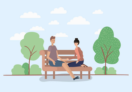 坐在公园椅上的年轻情侣情侣