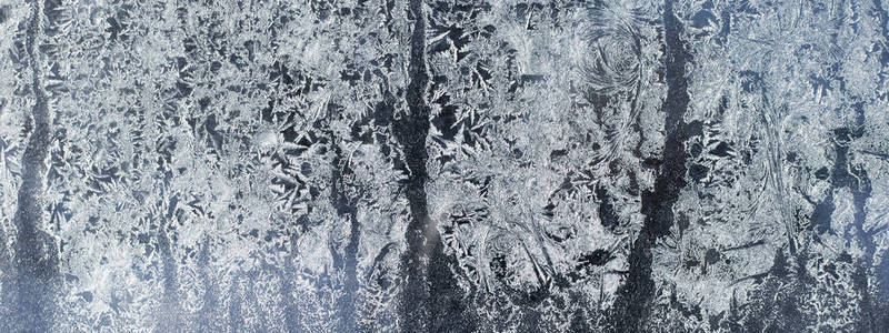 冷若冰霜的玻璃冰背景, 自然美丽的雪花。冰霜冰纹