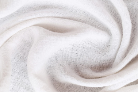 印花窗帘波纹的面料的白色印花棉布照片